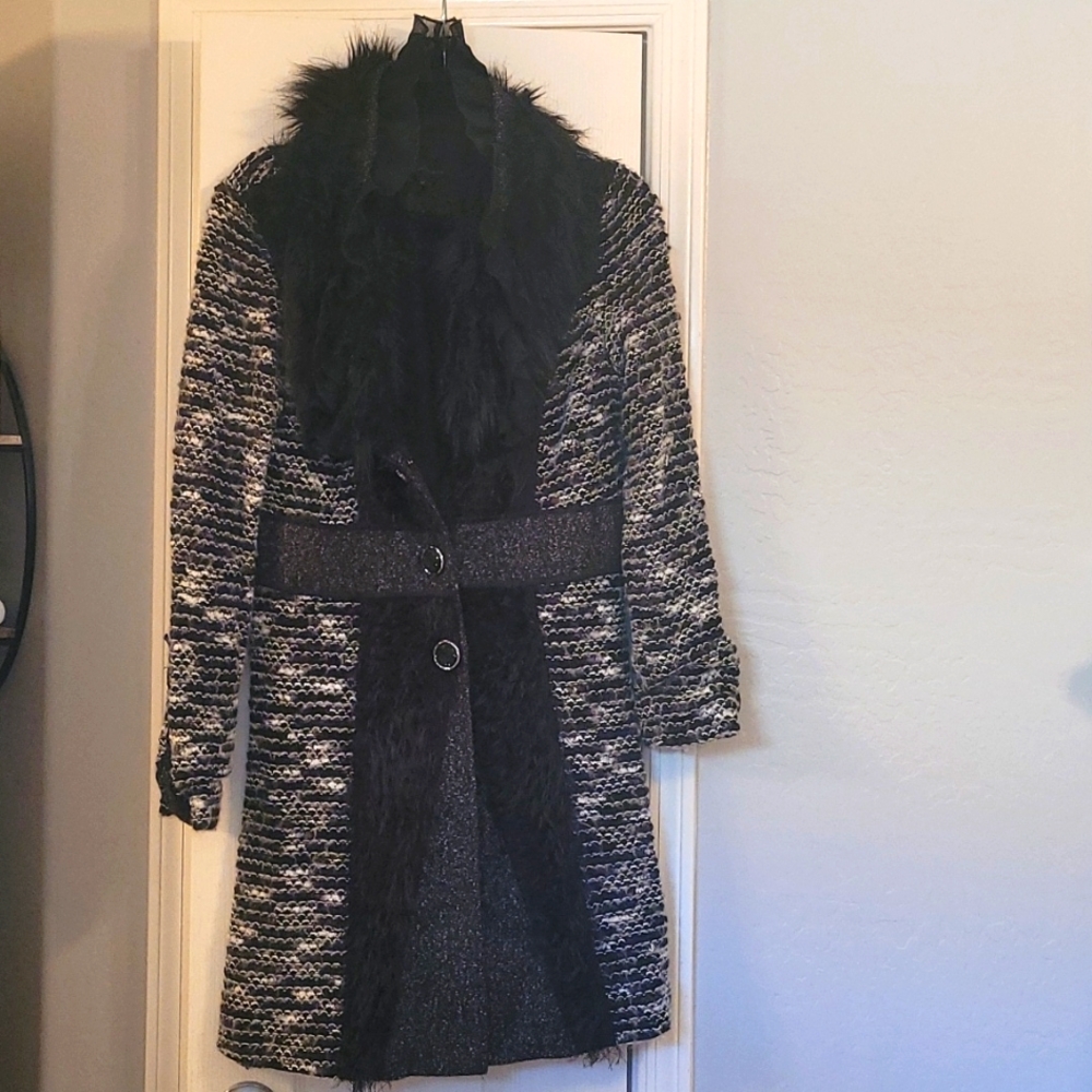 Black jacket with ruffled detail